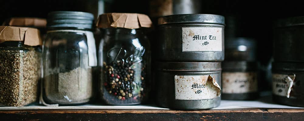 jars and canisters stored in a pantry