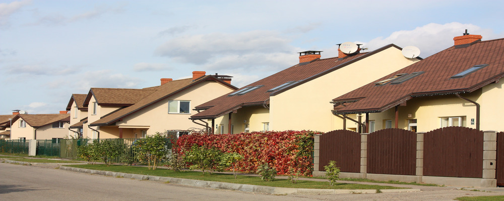 Line of cottages along a road